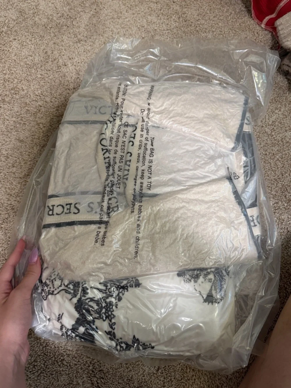 Victoria's Secret Cream Blanket with Black Floral Print and Red Ribbon Accent